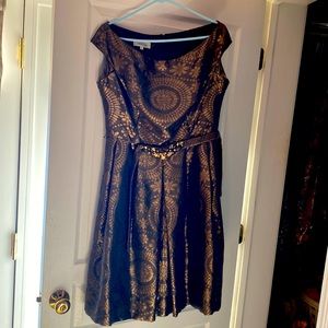 Gorgeous dress for fine occasions. Used twice for weddings. Brown with gold